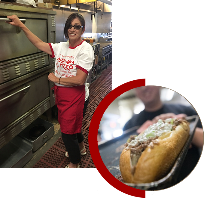 A woman in an oven and a hot dog